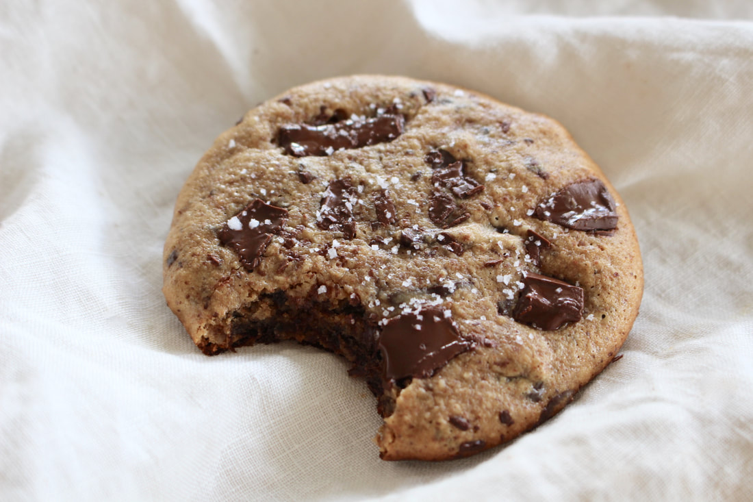 Paleo Chocolate Chip Cookies- chewy, gooey, fluffy, sweet, warm goodness. You won't even realize these are paleo. #paleo #paleodesserts #paleotreats #almondbuttercookies #chocolate #dessert #chocolatechipcookies #healthydessert #glutenfreecookies #glutenfreedesserts