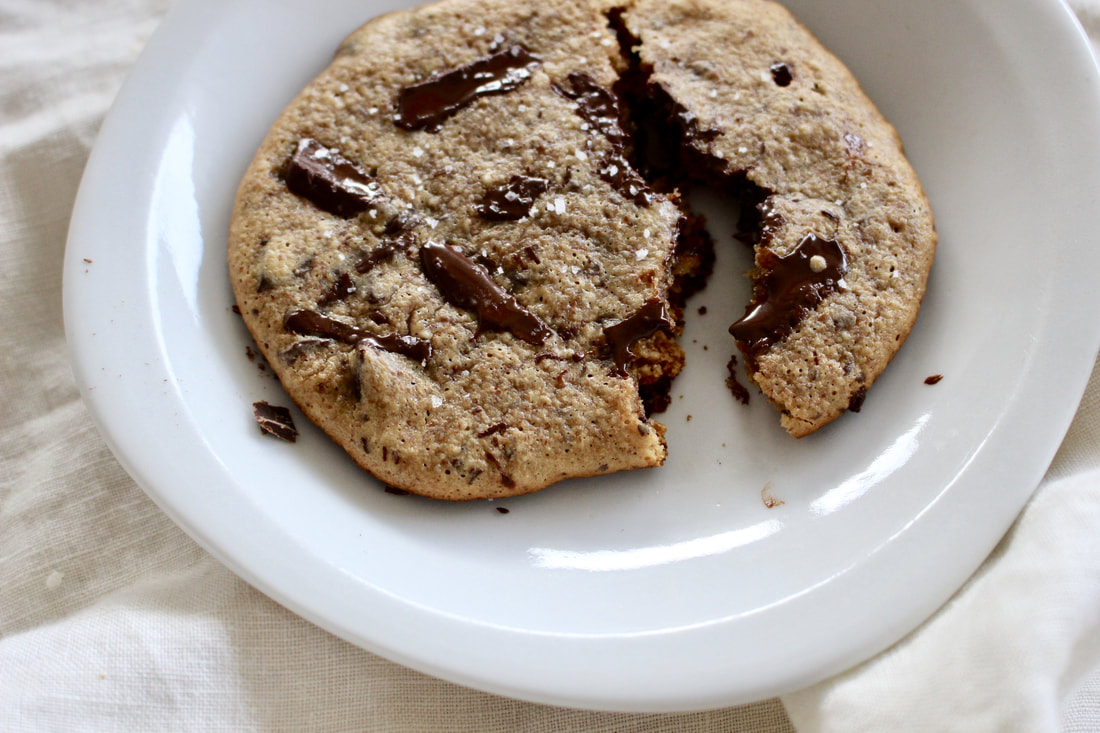 Paleo Chocolate Chip Cookies- chewy, gooey, fluffy, sweet, warm goodness. You won't even realize these are paleo. #paleo #paleodesserts #paleotreats #almondbuttercookies #chocolate #dessert #chocolatechipcookies #healthydessert #glutenfreecookies #glutenfreedesserts